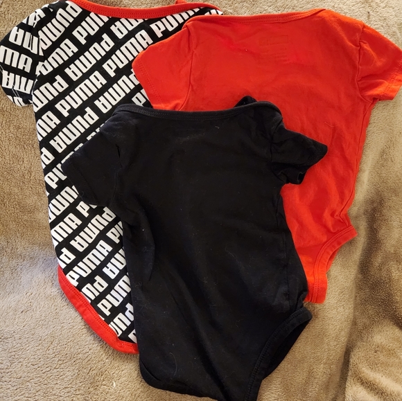 Three PUMA size 6 to 9 month onesies. New! - Picture 6 of 6
